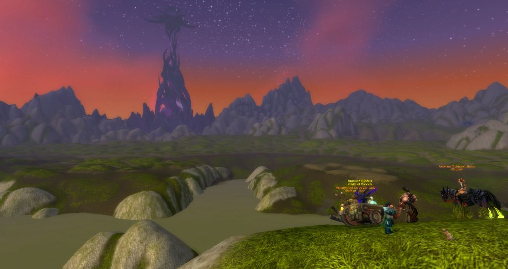 Da Doctas Tour pauses on the shore of the drained Loch Modan. Twilight Citadel can be seen in the distance.