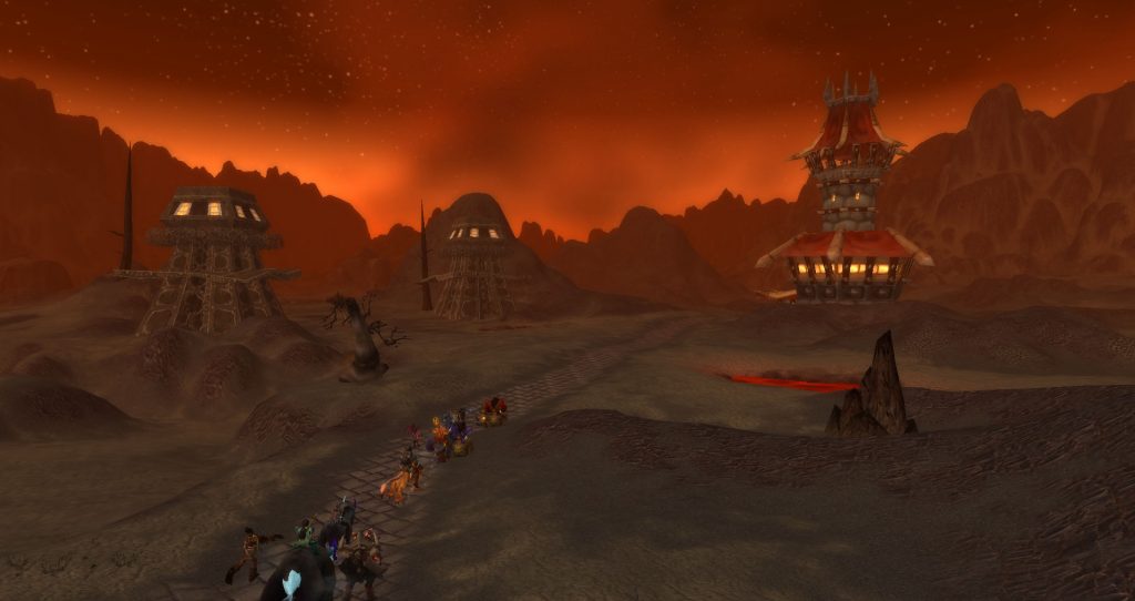 Da Doctas Tour continues through the Burning Steppes. Dark Iron dwarf towers are on the left and an orc tower is on the right.