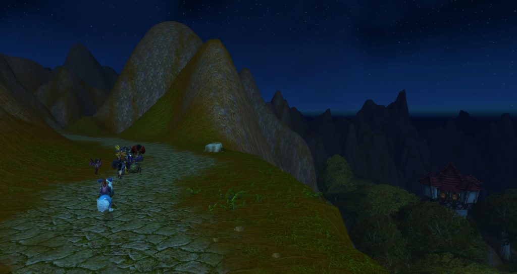 A human mage tower can just be seen in the valley to the right of the secret pass through the Redridge Mountains